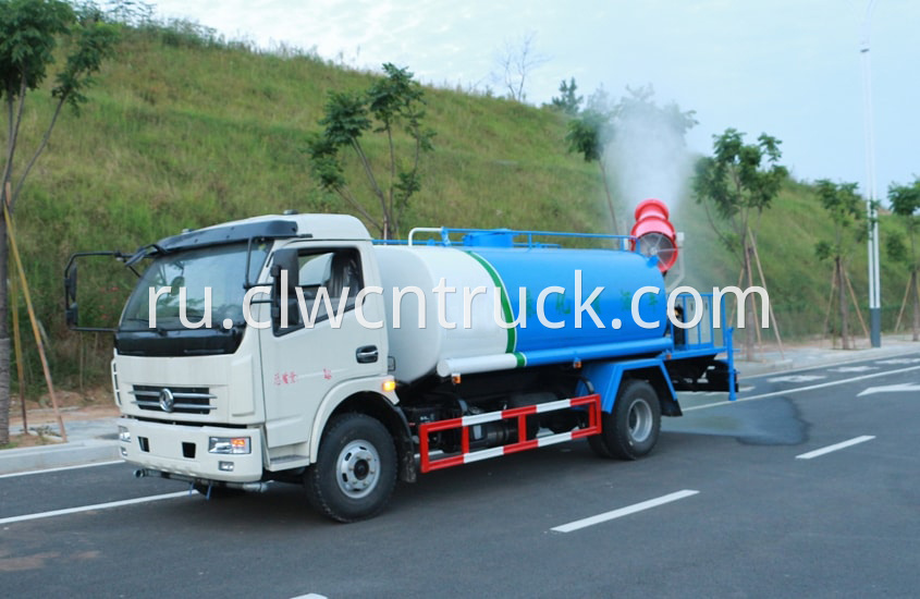 pesticide spraying truck in action 1